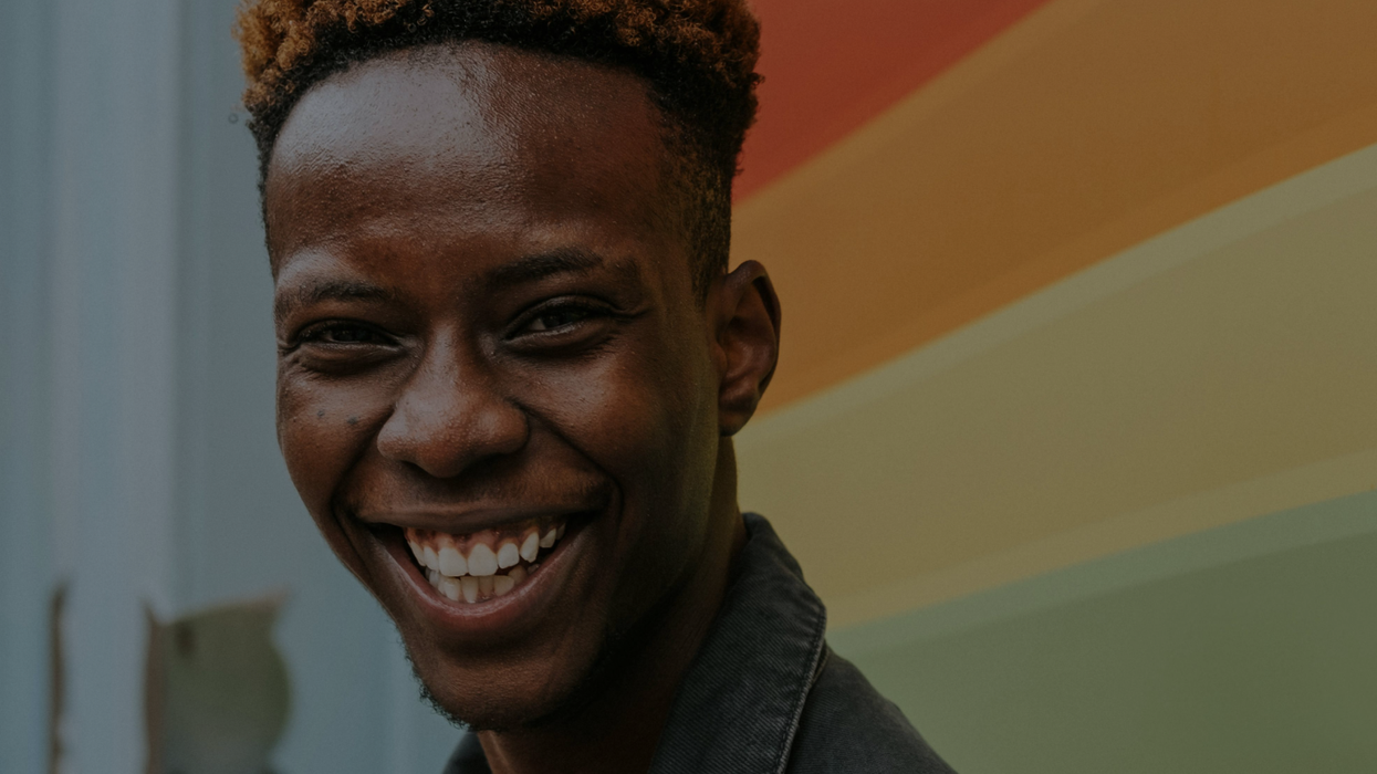 Person with rainbow flag