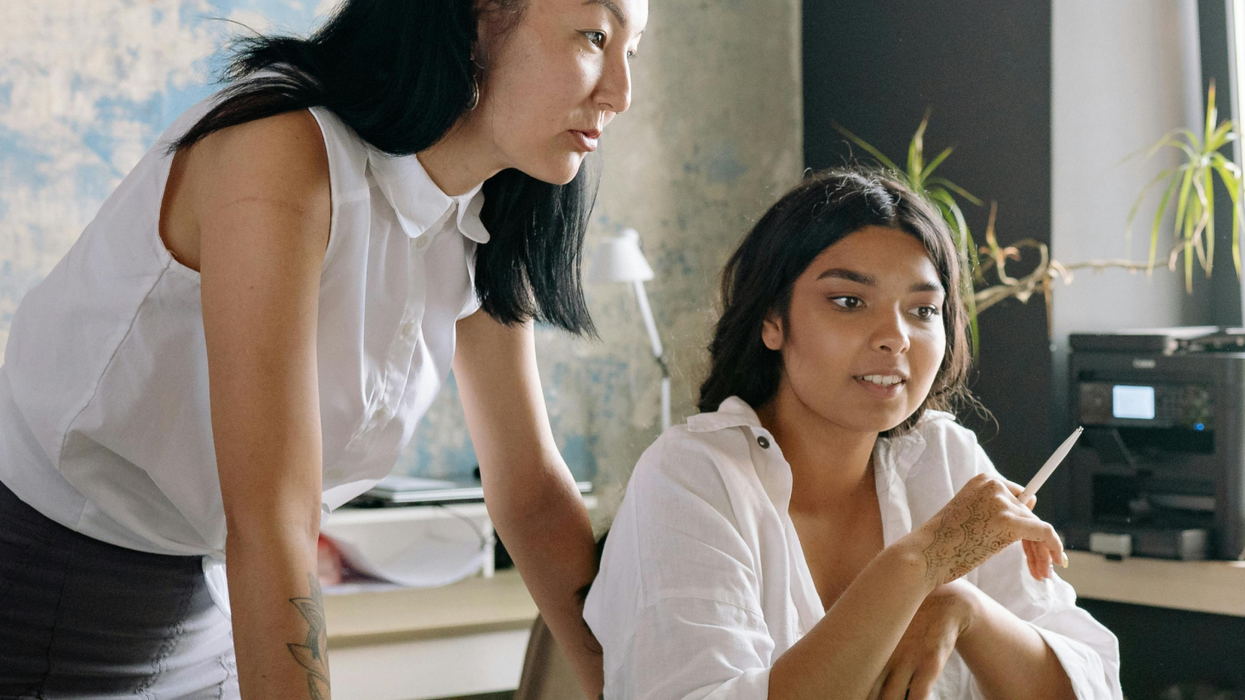 Two people working together