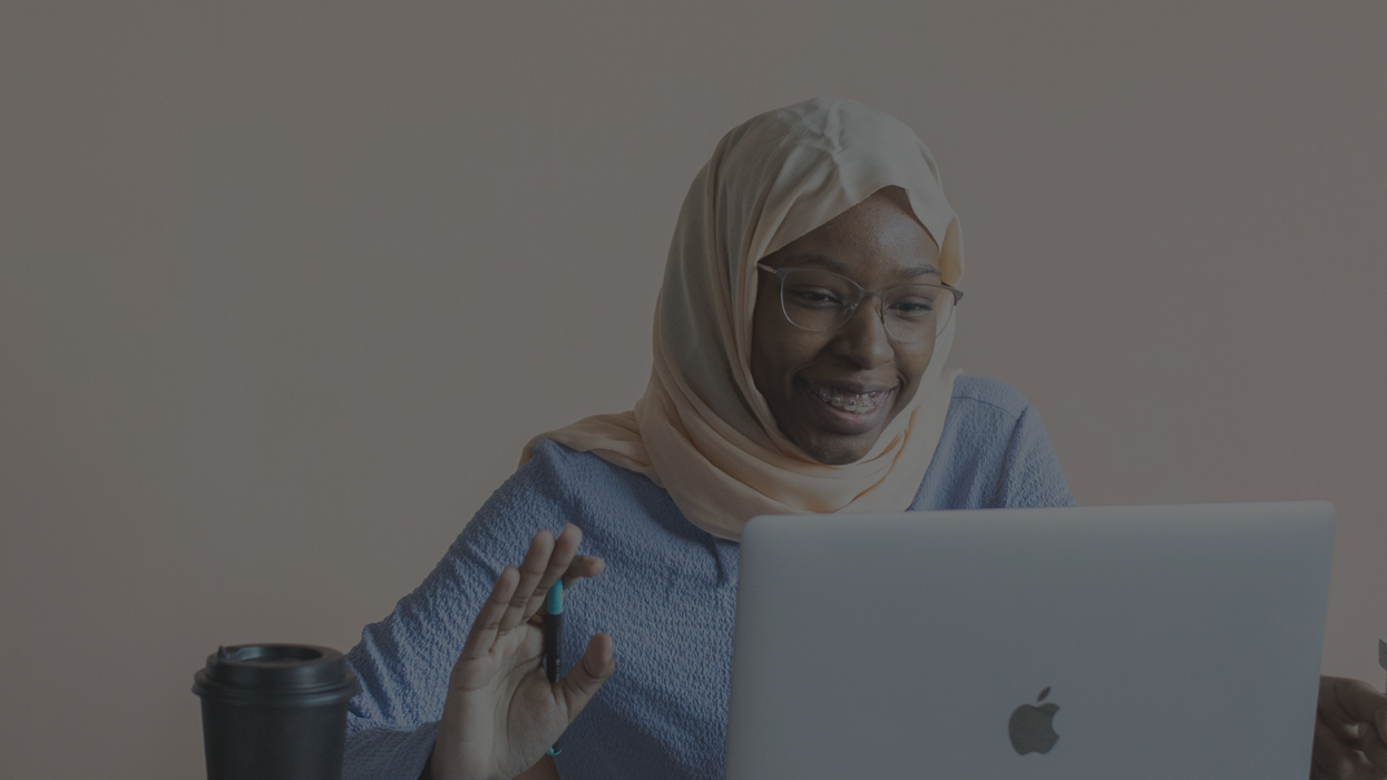 Woman on laptop attending virtual job fair