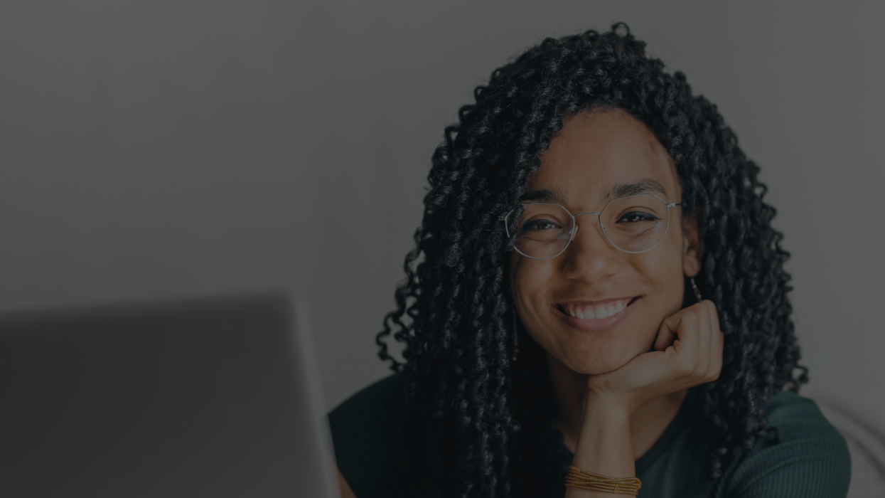 Woman on laptop attending virtual job fair