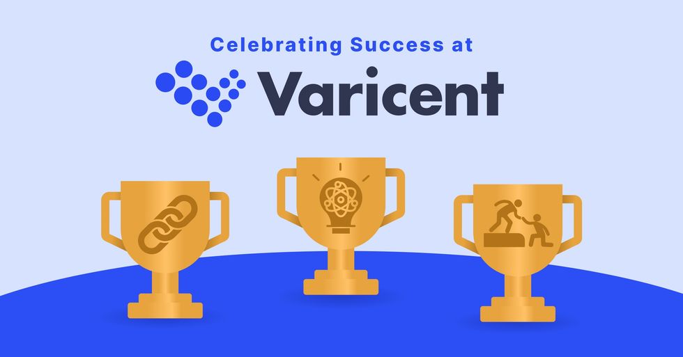 A graphic image of three trophies on top of a blue table with text saying: Celebrating Success at Varicent