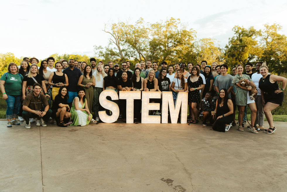 A group of diverse people who work at Stem with the word Stem