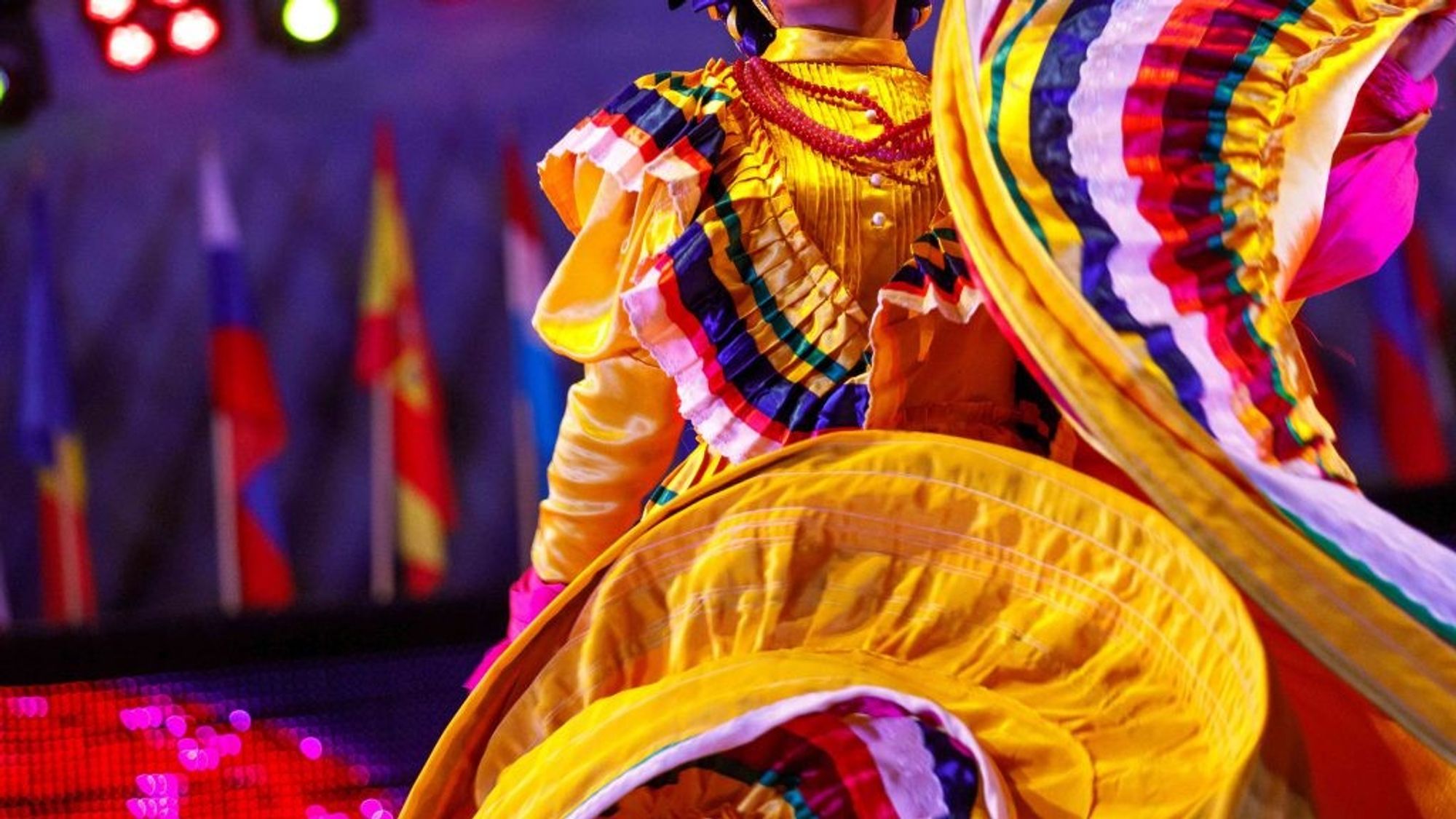 Bright and colorful dress on a woman celebrating Hispanic Heritage Month