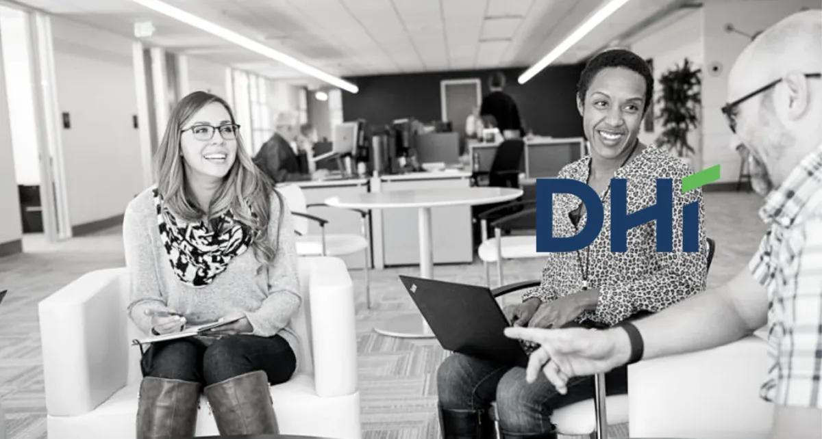 DHI case study - two people sitting on chairs with notepad and laptop