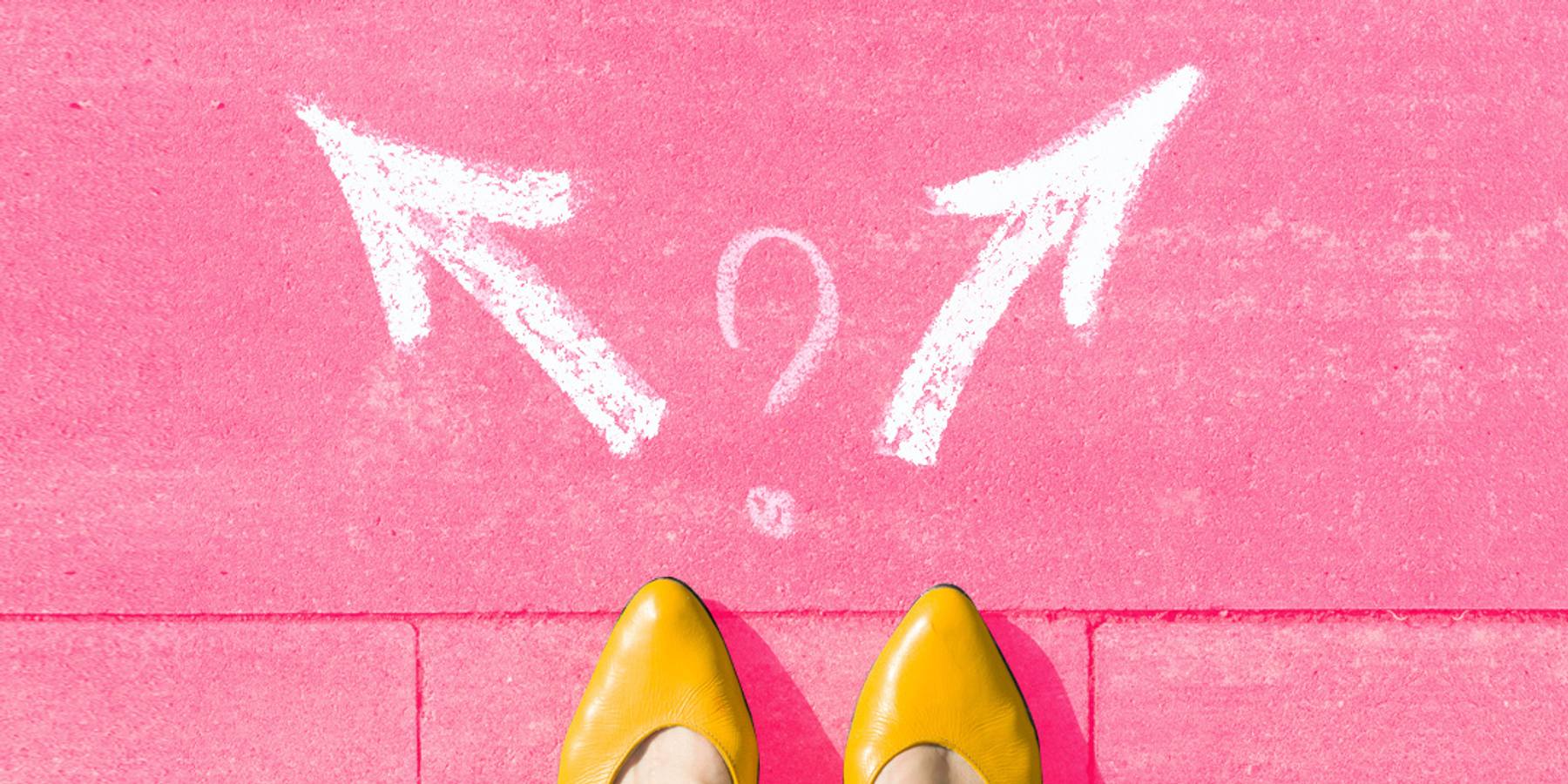 Feet planted on the sidewalk with two arrows in front of them pointing in opposite directions