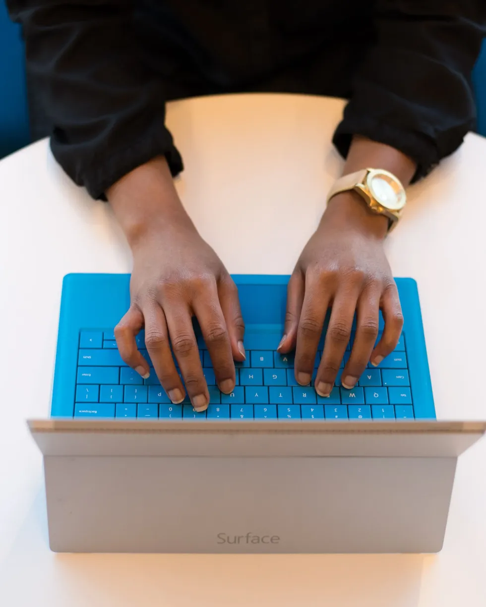 Hands on laptop signing up for Diversity Reboot newsletter