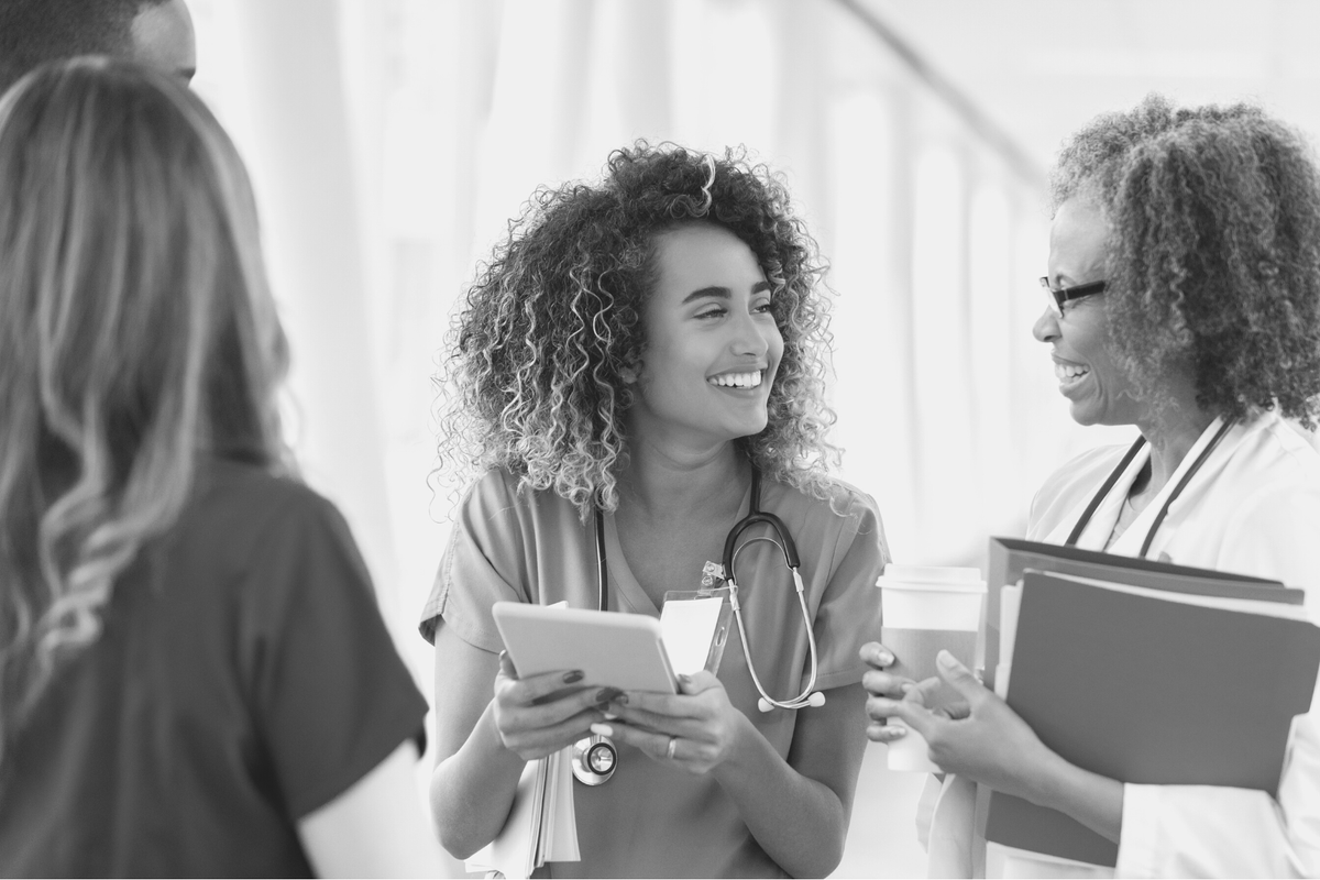 Healthcare providers talking with each other