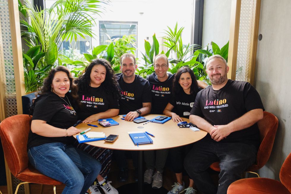 Members of the Latinx at Expedia Group sitting around a table