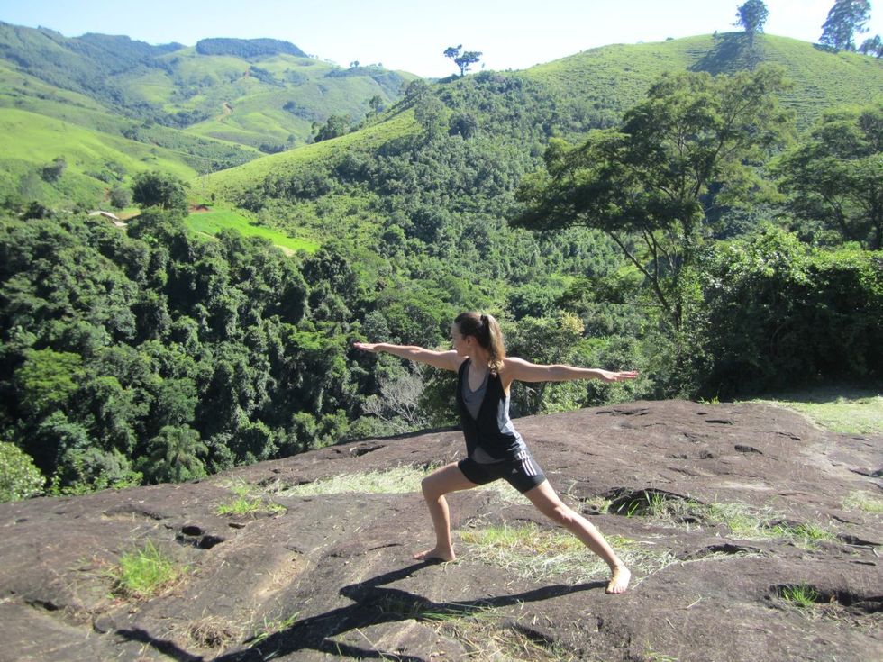 Person doing a yoga pose in nature