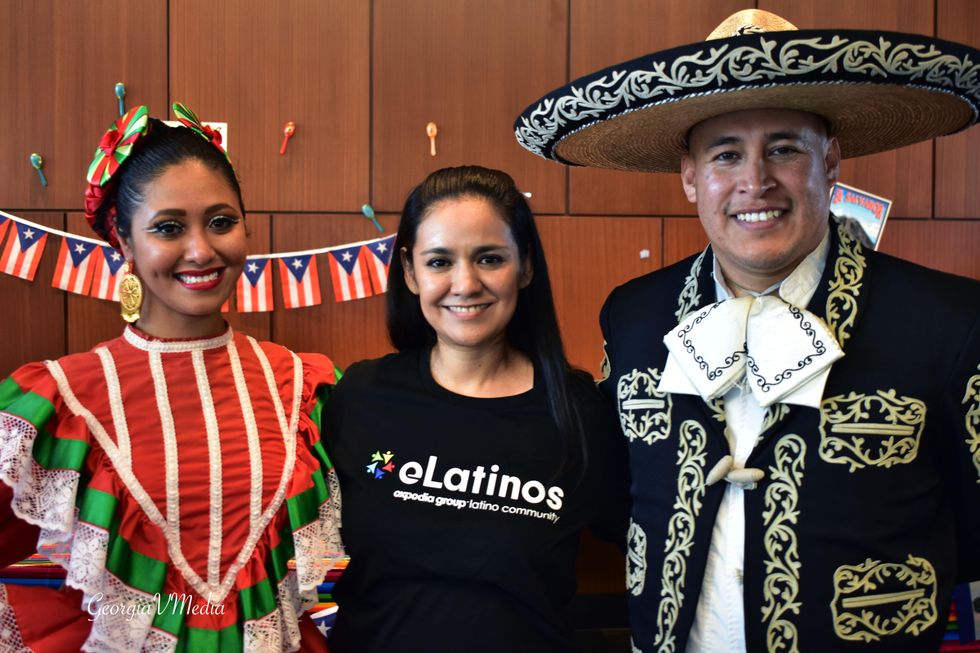 Photo caption: Daniela Veloz, president of our Latinx IBG, celebrates HHM with two performers.
