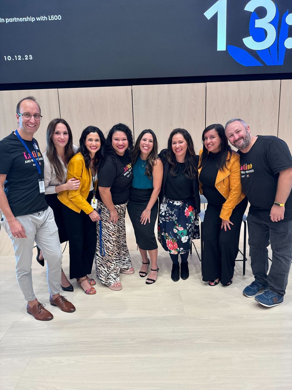 Photo of Expedia Group employees posing for a photo