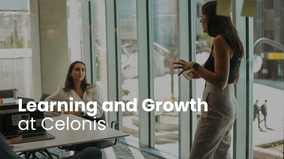 Photo of two female employees in an office with text saying: Learning and Growth at Celonis. 