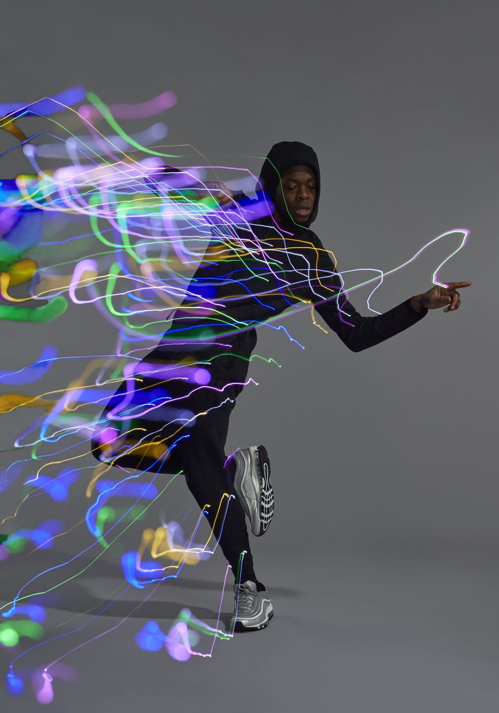 SoftwareOne employee dancing with Pride lights