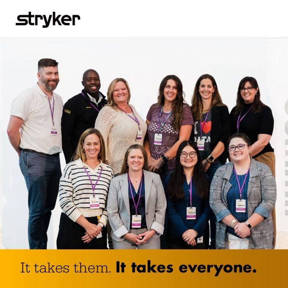Stryker team members standing together at a company event, highlighting collaboration and the people behind healthcare innovation.