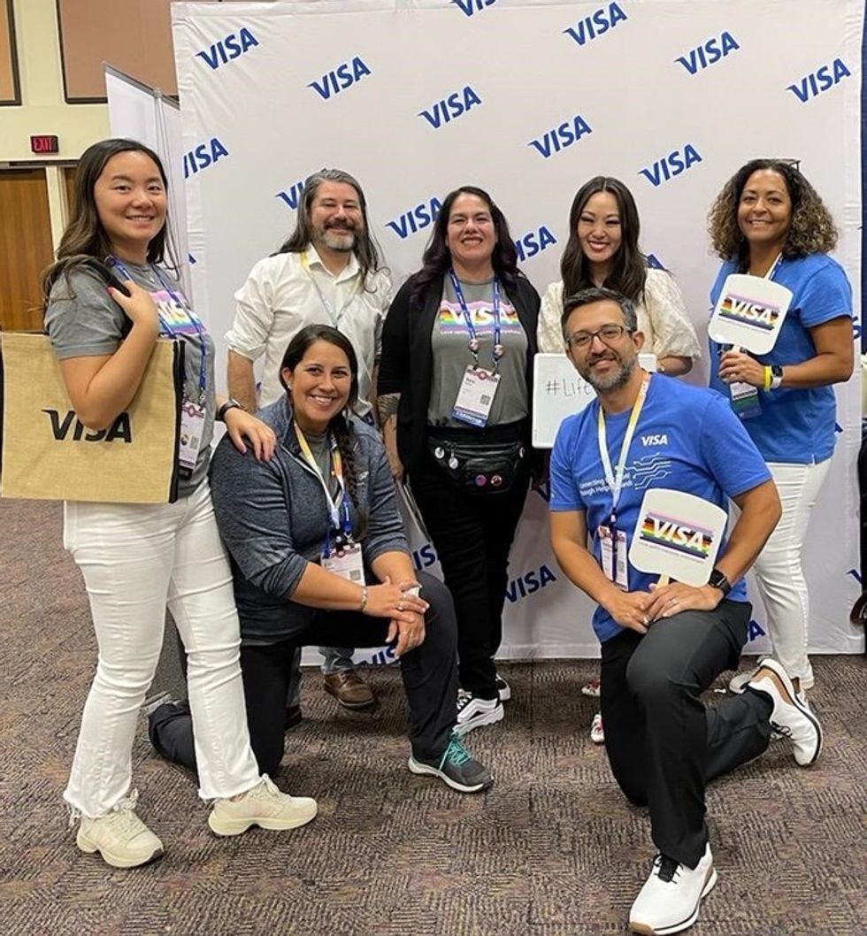 Visa employees posing for a photo
